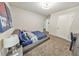 Bright bedroom featuring a comfy bed and a workspace at 437 Livingston Pt, Acworth, GA 30102