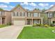 Two story house exterior with a two car garage and nicely landscaped lawn at 437 Livingston Pt, Acworth, GA 30102