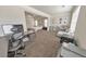Home office with desk, chair, and ample natural light at 437 Livingston Pt, Acworth, GA 30102
