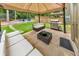 Outdoor patio area with grill and seating at 437 Livingston Pt, Acworth, GA 30102