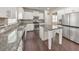Spacious kitchen featuring granite island and stainless steel appliances at 437 Livingston Pt, Acworth, GA 30102