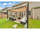 Relaxing backyard with pergola, seating area, and grill at 437 Livingston Pt, Acworth, GA 30102