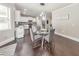 Bright dining area with glass table and four gray chairs at 437 Livingston Pt, Acworth, GA 30102