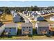 Aerial view of houses with gray siding and wooden decks at 675 Highgrove Way, Dallas, GA 30157