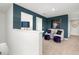Spacious loft area with a cozy seating area, perfect for relaxation or a home theatre at 12000 Conrad Cir, Hampton, GA 30228
