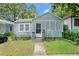 Gray house with a lattice-covered porch and small yard at , Atlanta, GA 30318
