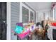 Cluttered front porch with storage boxes at , Atlanta, GA 30318