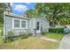 Gray house with a lattice-covered porch and small yard at , Atlanta, GA 30318