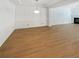 Formal dining room with wainscoting and hardwood floors at 4795 Hastings Ter, Alpharetta, GA 30005