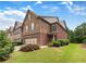 Two-story townhome with stone and brick exterior at 4795 Hastings Ter, Alpharetta, GA 30005