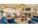Open concept living space with kitchen views, a comfy sofa and a large TV at 1107 N Van Wert Rd, Villa Rica, GA 30180