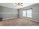 Spacious bedroom with neutral walls, carpet flooring and a ceiling fan at 1107 N Van Wert Rd, Villa Rica, GA 30180