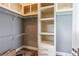 Ample walk-in closet with wire shelving and additional storage at 1107 N Van Wert Rd, Villa Rica, GA 30180