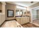 Bathroom with double vanity, large mirrors and a view into the shower at 1107 N Van Wert Rd, Villa Rica, GA 30180