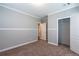 Bright bedroom with carpeted floor, spacious closet, and neutral color palette at 1107 N Van Wert Rd, Villa Rica, GA 30180