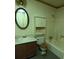 Bathroom with a tub, toilet, vanity, and medicine cabinet at 2900 Kevin Ln, Jonesboro, GA 30236