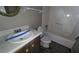 Clean bathroom with a bathtub, toilet and sink at 2900 Kevin Ln, Jonesboro, GA 30236