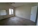 Spacious bedroom with large window and ceiling fan at 2900 Kevin Ln, Jonesboro, GA 30236