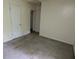 Bedroom with double doors and stained carpet at 2900 Kevin Ln, Jonesboro, GA 30236