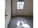 Empty bedroom with window and carpeted floor at 2900 Kevin Ln, Jonesboro, GA 30236