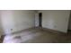 Empty bedroom with light-colored walls and carpeted floor at 2900 Kevin Ln, Jonesboro, GA 30236