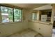 Small dining area with a breakfast bar and tile floor at 2900 Kevin Ln, Jonesboro, GA 30236