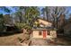 Two story home with attached garage and landscaping at 2900 Kevin Ln, Jonesboro, GA 30236