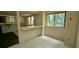 Kitchen with breakfast bar and view of wooded area at 2900 Kevin Ln, Jonesboro, GA 30236