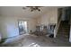 Open living area with high ceilings and stairs at 2900 Kevin Ln, Jonesboro, GA 30236