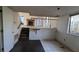 Open living room with fireplace and staircase at 2900 Kevin Ln, Jonesboro, GA 30236