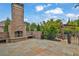 Brick outdoor fireplace and patio area at 3830 Teesdale Ct, Sandy Springs, GA 30350