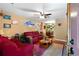 Bright living room with comfy sofas, a coffee table, and built-in shelving at 705 Inglewood Se Dr, Smyrna, GA 30080