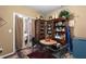 Charming sitting area with a small table and curio cabinet at 705 Inglewood Se Dr, Smyrna, GA 30080