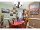 Charming dining area with a round table and colorful decor at 705 Inglewood Se Dr, Smyrna, GA 30080