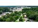 Aerial view of houses and roads, showcasing the neighborhood's landscape and proximity to amenities at 705 Inglewood Se Dr, Smyrna, GA 30080