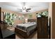 Cozy bedroom featuring a comfortable bed and wood accents at 705 Inglewood Se Dr, Smyrna, GA 30080