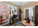 Cozy sitting area with built-in shelving and a fireplace at 705 Inglewood Se Dr, Smyrna, GA 30080