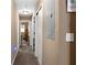 Clean hallway with neutral tones and multiple doors at 705 Inglewood Se Dr, Smyrna, GA 30080