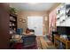 Versatile sitting area with a table and built-in shelving at 705 Inglewood Se Dr, Smyrna, GA 30080