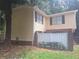 Tan two-story home with private backyard at 1847 Whitehall Forest Se Ct, Atlanta, GA 30316