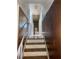 Classic staircase with wooden steps and railing at 4020 Adamsville Sw Dr, Atlanta, GA 30331