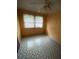 Bright bedroom with diamond patterned flooring at 4020 Adamsville Sw Dr, Atlanta, GA 30331