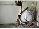 Unfinished basement with exposed pipes and water heater at 126 Irvin St, Jonesboro, GA 30236