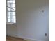 Simple bedroom with wood floors and a window needing cosmetic updates at 126 Irvin St, Jonesboro, GA 30236