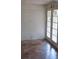 Simple dining room with tiled floor and French doors at 126 Irvin St, Jonesboro, GA 30236
