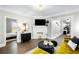 Open living room showcasing hardwood floors and views into other rooms at 976 Washington St, Atlanta, GA 30315