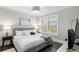 Bright bedroom featuring a king-size bed and plenty of natural light at 976 Washington St, Atlanta, GA 30315