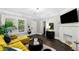 Living room features hardwood floors, fireplace, and access to other rooms at 976 Washington St, Atlanta, GA 30315