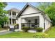 White brick house with a porch and landscaping at 976 Washington St, Atlanta, GA 30315