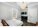 Bedroom with a queen bed, dresser and window at 976 Washington St, Atlanta, GA 30315